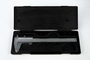 vernier caliper metal with product container box packaging on plain isolated white background