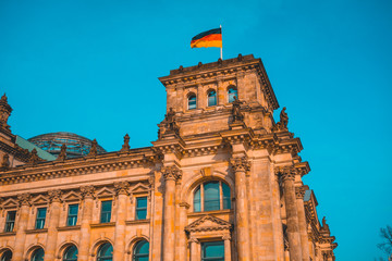 Fototapeta na wymiar detailed view of bundestag building with german flag