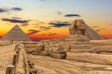 The Sphinx and the Pyramids at sunset, beautiful view, Giza, Egypt