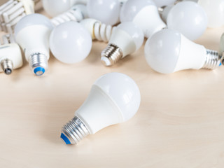 one LED bulb light and many different lamps