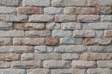 Light brick wall made of natural stone