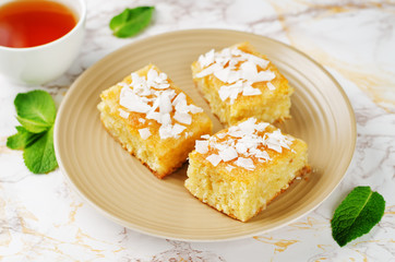Coconut Breakfast Bars with fresh coconut sprinkles