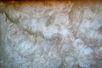 Texture of the old plastered wall with cracks. Texture backround.