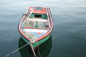Plakat boat at the harbour