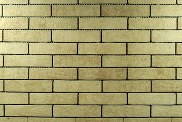  clinker beige tile on the wall background                              