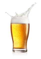 Steamed glass of light beer with splash - 268414879