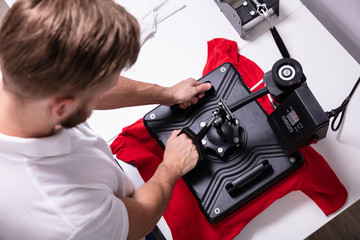 Printing on t shirt in workshop