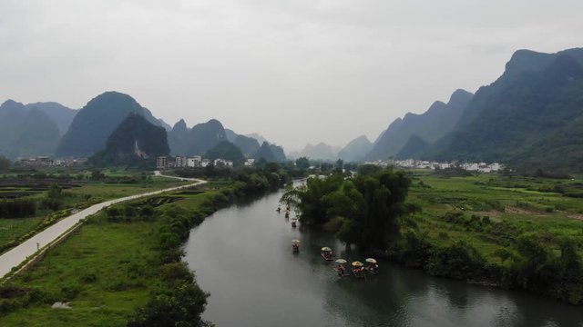 Aerial View of Yangshuo and Guilin Area in China. River Li, Ecological Rice Fields and Magical Mountains of Guilin. Nature and Travel Concept..