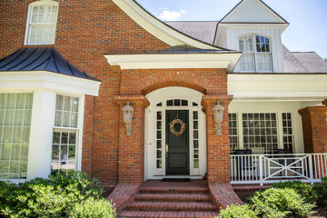 Front Door of Large Red Brick Traditional Colonial Home House 