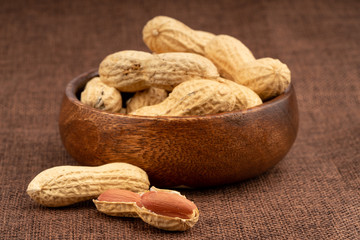 dried  peanuts with shell on white background