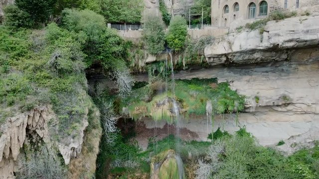 View from drone on waterfall on Sant Miquel del Fai in the Spain.