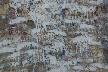 gray white texture of paint stains on dirty old wall