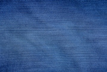blue fabric texture of mashed and shabby denim on pants
