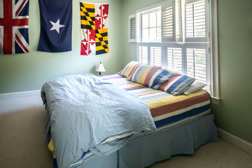 Boys Bedroom in a House in the Suburbs Decorated with Flags