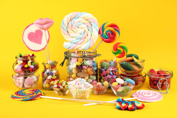 candies with jelly and sugar. colorful array of different childs sweets and treats.