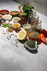 Spices and herbs on table. Food and cuisine ingredients with basil