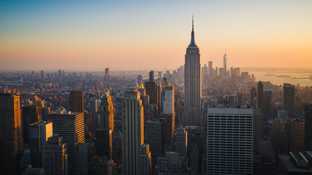 New York City Skyline with Urban Skyscrapers at Sunset, USA - Powered by Adobe