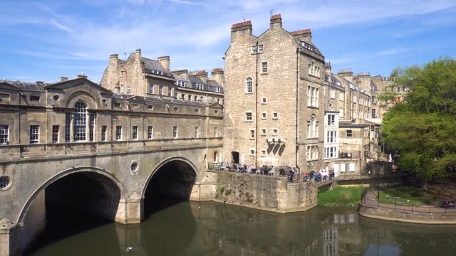 Bath, England. River Avon shot with Pulteney bridge, and the city of Bath's skyline