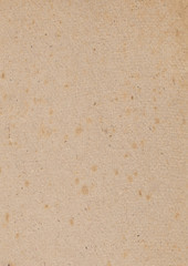 Texture old paper with traces of scuffs and stains.