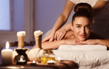 Obraz na płótnie Canvas Herbal Aroma Massage. Woman Relaxing In Spa Salon