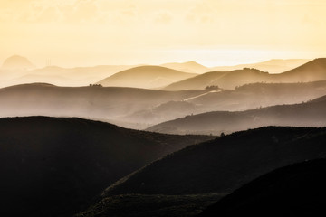 Fototapeta na wymiar Layers of Hills at Sunset