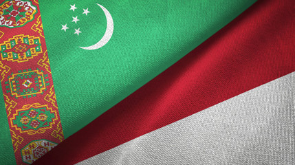 Turkmenistan and Indonesia two flags textile cloth, fabric texture