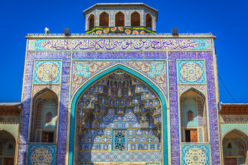Decorated tiled on the gate of complex of Shah Cheragh mosque in Shiraz, Iran