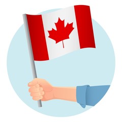 Fototapeta na wymiar Canada flag in hand icon