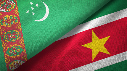 Turkmenistan and Suriname two flags textile cloth, fabric texture