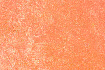 coral painted concrete textured abstract background