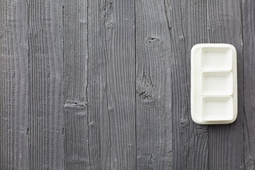 Empty Plate on wooden background. Top View with Text Space