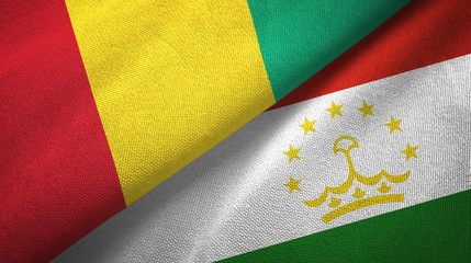 Guinea and Tajikistan two flags textile cloth, fabric texture