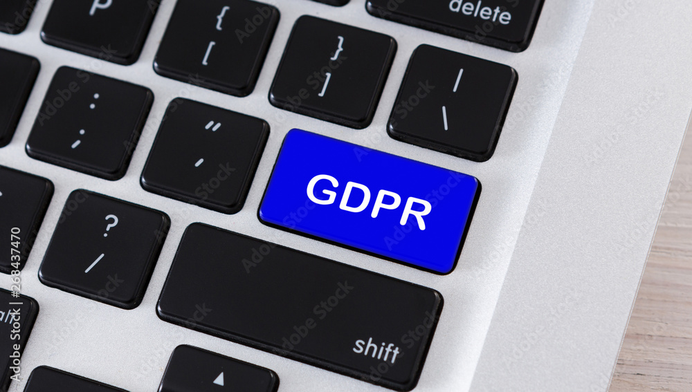 Poster text gdpr on blue keyboard button, closeup