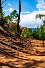 Large colorful ochre deposits, located in Roussillon, small Provensal town in  Natural Regional Park of Luberon, South of France