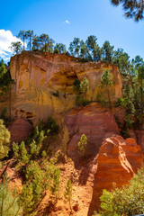 Large colorful ochre deposits, located in Roussillon, small Provensal town in  Natural Regional Park of Luberon, South of France