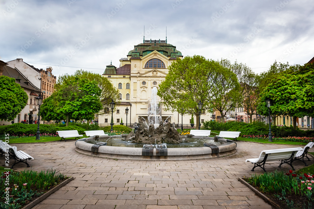 Wall mural fountain in front of state theatre at main square in kosice (slovakia)