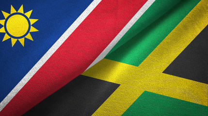 Fototapeta premium Namibia and Jamaica two flags textile cloth, fabric texture