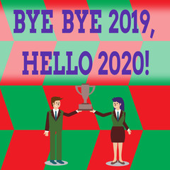 Writing note showing Bye Bye 2019 Hello 2020. Business concept for saying goodbye to last year and welcoming another good one Man and Woman Business Suit Holding Championship Trophy Cup