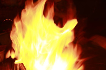 Fototapeta premium Glowing Yellow and orange colour Fire flames background