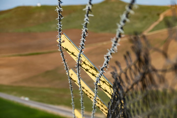 creating barbed fence to prevent smuggling and immigrants at the borders,