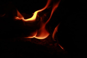 Beautiful stylish artistic fire flames on black background.