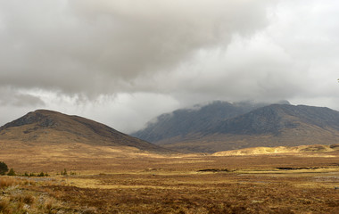 Fototapeta na wymiar Cloud covered mountain in Scottish Highlands, Beinn Dearg at Loch Glascarnoch