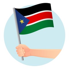 South Sudan flag in hand