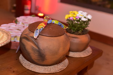 clay pot on wooden dining table, hoedown