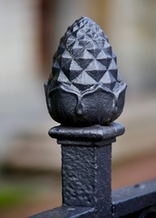 Wrought Iron fencepost pinecone shape in New Orleans