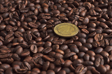 Coin of 500 guaranies from Paraguay stating on a coffee beans bed