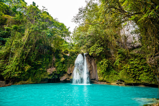 Kawasan Falls on Cebu island in Philippines, turquoise waterfalls