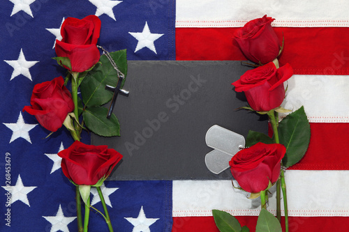 American flag with roses and military dog tags