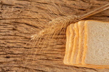 Bread on a wooden table on an old wooden floor.