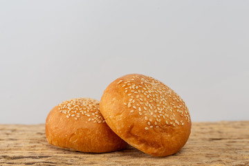 Bread on a wooden table on an old wooden floor.